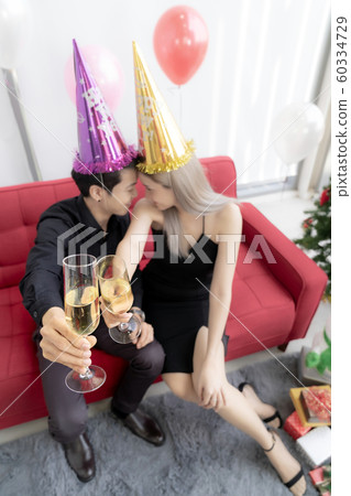 Couple celebrate new year party Couple celebrate new year party 60334729