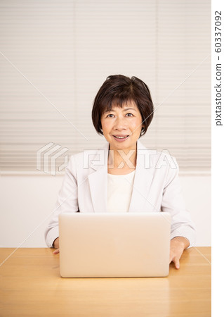 Senior female laptop Senior female laptop 60337092
