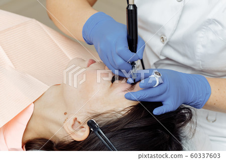 Permanent makeup, tattooing of eyebrows. 60337603