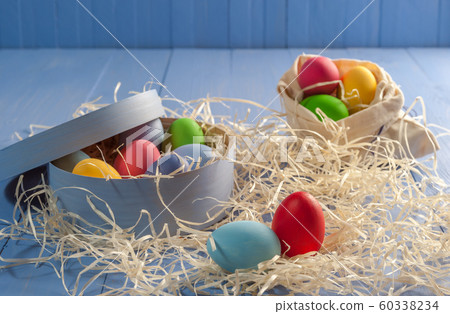 Happy easter painted eggs on table Happy easter painted eggs on table 60338234