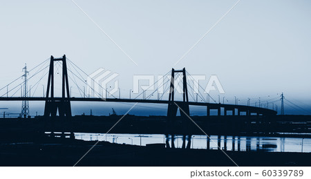Silhouette of the suspension bridge blue toned Silhouette of the suspension bridge blue toned 60339789
