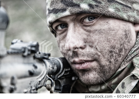 Army soldier infantryman shooting with service rifle 60340777