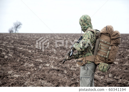 Portrait of modern army infantryman on march Portrait of modern army infantryman on march 60341194