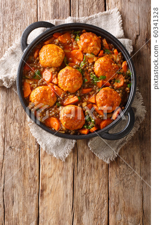 Tasty meatballs served with lentils and vegetables Tasty meatballs served with lentils and vegetables 60341328