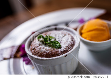 Chocolate souffle and ice cream 60342201