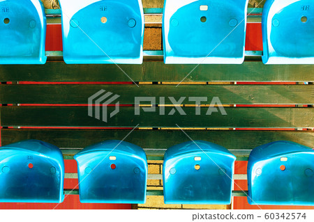 Empty plastic seats. 60342574