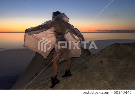Silhouette of a young and sexy girl.  60343445