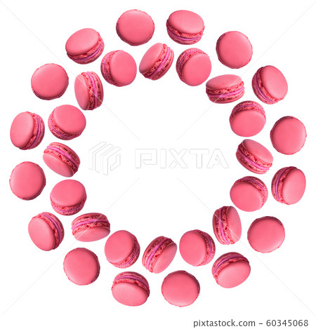 Round frame of pink french macarons cakes isolated Round frame of pink french macarons cakes isolated 60345068