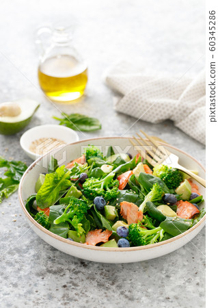 Salmon fish and avocado salad with fresh spinach 60345286
