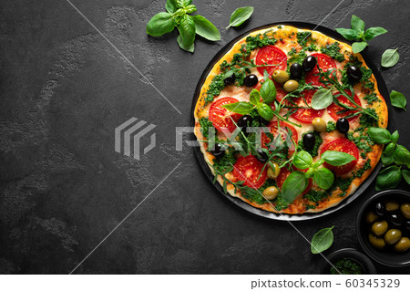 Pizza. Traditional italian pizza with green basil Pizza. Traditional italian pizza with green basil 60345329