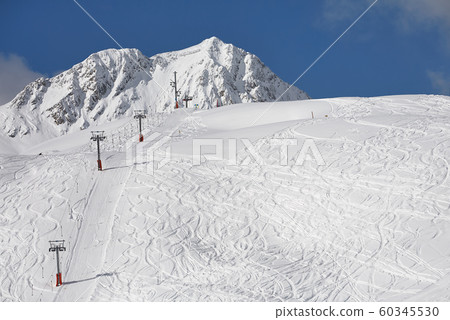 Skiing slopes sunny weather Skiing slopes sunny weather 60345530