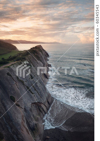 Coast Landscape Of Famous Flysch In Zumaia at sunset, Basque Country, Spain. Famous Geological 60345543