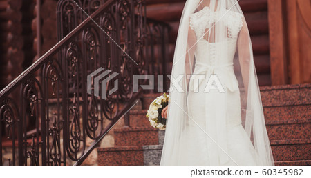 bride's back in lace dress 60345982
