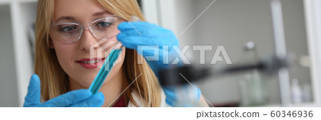 Technician hold in arms in protective gloves Technician hold in arms in protective gloves 60346936
