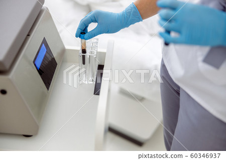 Beautician doing preparation of blood for injections Beautician doing preparation of blood for injections 60346937