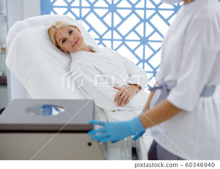 Pretty adult woman is ready for injection Pretty adult woman is ready for injection 60346940