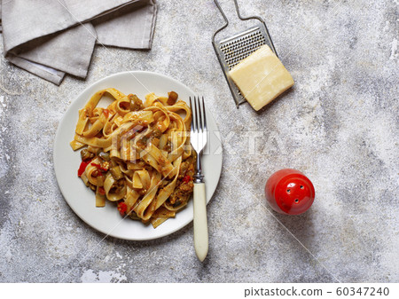 Pasta with eggplant and tomatoes 60347240