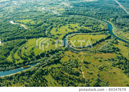 Aerial View Green Forest Woods And River Landscape In Sunny Summer Day. Top View Of Beautiful European Nature From High Attitude In Summer Season. Drone View. Bird's Eye View Aerial View Green Forest Woods And River Landscape In Sunny Summer Day. Top View Of Beautiful European Nature From High Attitude In Summer Season. Drone View. Bird's Eye View 60347679