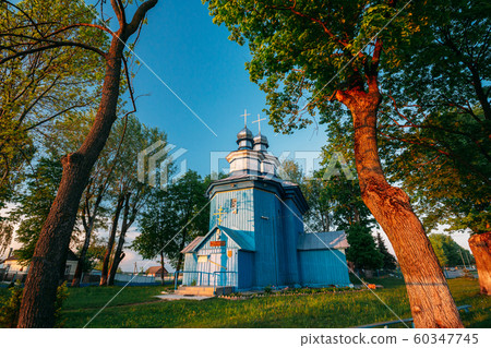 Staraya Belitsa, Uritskiy Sel'sovet , Gomel Region, Belarus. Old Wooden Orthodox Church Of St Nicholas The Wonderworker During Summer Sunset. Orthodox Church Of St. Nikolaya Chudotvortsa Staraya Belitsa, Uritskiy Sel'sovet , Gomel Region, Belarus. Old Wooden Orthodox Church Of St Nicholas The Wonderworker During Summer Sunset. Orthodox Church Of St. Nikolaya Chudotvortsa 60347745
