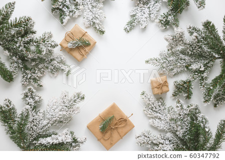 Fur spruce pine coniferous branches, toys and gift box isolated on white background. Fur spruce pine coniferous branches, toys and gift box isolated on white background. 60347792