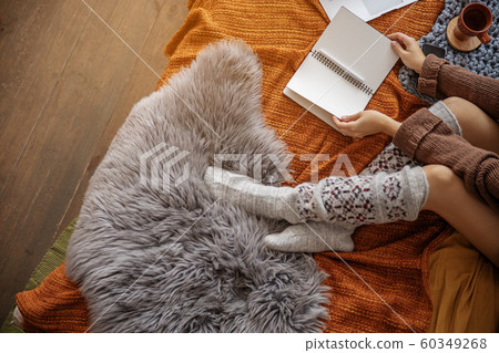 Top view of woman is holding notebook Top view of woman is holding notebook 60349268