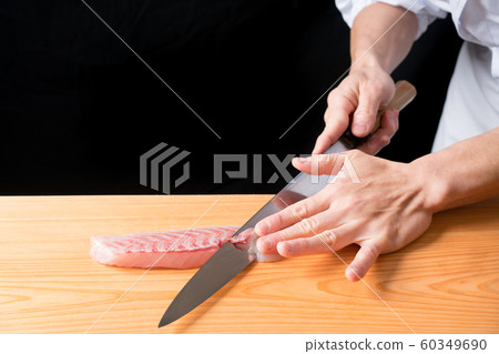 In front of the board to pull the sashimi In front of the board to pull the sashimi 60349690