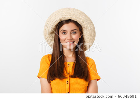 Travel concept - Close up Portrait young beautiful attractive girl wtih trendy hat and smiling. White Background. Copy space. Travel concept - Close up Portrait young beautiful attractive girl wtih trendy hat and smiling. White Background. Copy space. 60349691