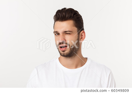 Portrait of the young happy smiling handsome man isolated on a white background Portrait of the young happy smiling handsome man isolated on a white background 60349809
