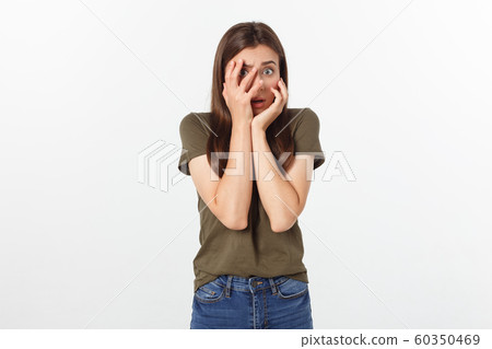 Close up photo beautiful lady arms hands raised hiding amazed full fear eyes facial expression scary movie hate thrillers. 60350469
