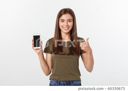 Girl Holding Smart Phone - Beautiful smiling girl holding a smart phone Girl Holding Smart Phone - Beautiful smiling girl holding a smart phone 60350673