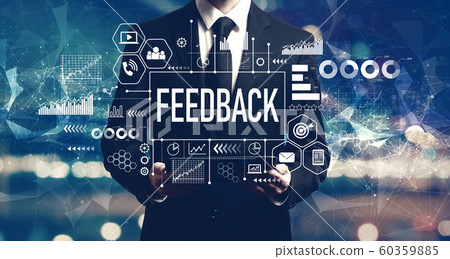 Feedback concept with businessman holding a tablet Feedback concept with businessman holding a tablet 60359885