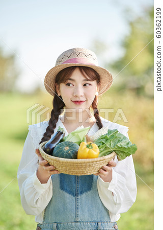 Agricultural girl lifestyle vegetables 60362199