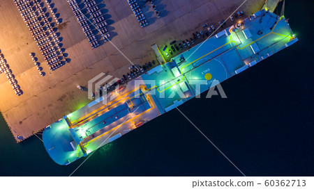 Aerial top view car carrier vessel at night, rows 60362713