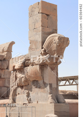 Stone statue of bull in Persepolis, Iran 60364492