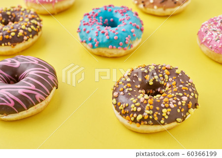 different types of colorful donats decorated sprinkles and icing different types of colorful donats decorated sprinkles and icing 60366199