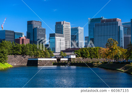 <Tokyo> The Marunouchi Office Building and Imperial Palace in Japan <Tokyo> The Marunouchi Office Building and Imperial Palace in Japan 60367135
