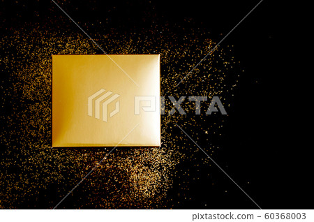 Golden gift box on black background 60368003