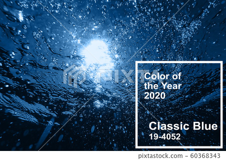 Classic blue main color trend of the Year 2020. sea surface with bubbles of air in transparent water Classic blue main color trend of the Year 2020. sea surface with bubbles of air in transparent water 60368343