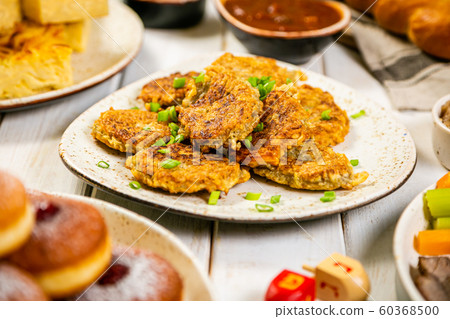 Selection of traditional hanukkah food for festive dinner, wood background Selection of traditional hanukkah food for festive dinner, wood background 60368500