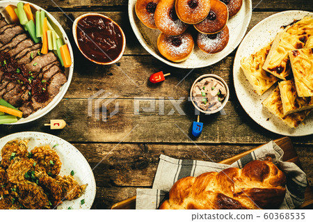 Selection of traditional hanukkah food for festive dinner, wood background Selection of traditional hanukkah food for festive dinner, wood background 60368535