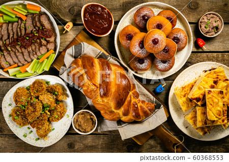Selection of traditional hanukkah food for festive dinner, wood background Selection of traditional hanukkah food for festive dinner, wood background 60368553