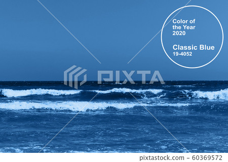 Classic blue main color trend of the Year 2020. Sea with waves against blue sky Classic blue main color trend of the Year 2020. Sea with waves against blue sky 60369572