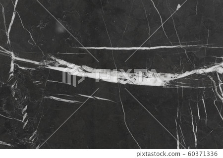 Close up of natural black marble stone background with white lines. Close up of natural black marble stone background with white lines. 60371336