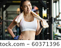 Woman fitness break 60371396