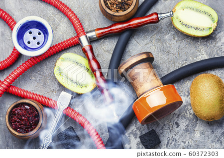 Fragrant smoking hookah with kiwi 60372303