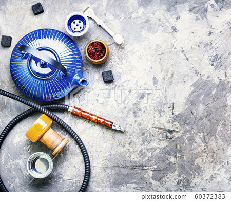 Oriental hookah and teapot. 60372383