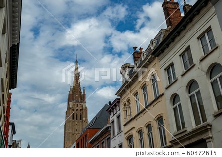 Beautiful church tower in Bruges, Belgium 60372615