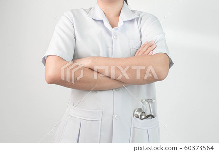 Confident woman doctor posing with arms crossed Confident woman doctor posing with arms crossed 60373564