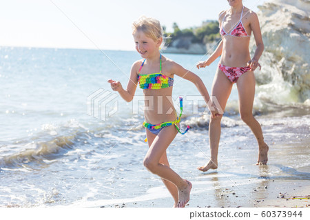 Family on the beach Family on the beach 60373944