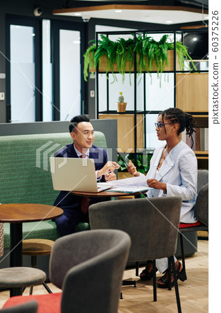 Business partners meeting in cafe Business partners meeting in cafe 60375226